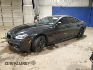 2014 BMW 6 Series 650i xDrive with VIN WBA6B4C55ED371574, listed as a Copart auction lot 79639814 with 106,772 mi miles and Salvage Title. Bid and sale history available at carsss.com. Image 1.