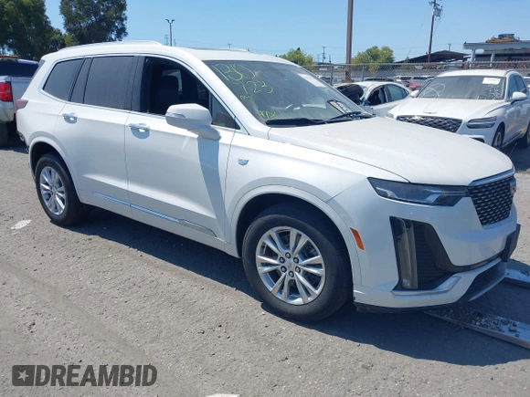 2021 Cadillac XT6 Luxury with VIN 1GYKPAR47MZ221123, listed as a IAAI auction lot 42374772 with 69,829 mi miles and . Bid and sale history available at DreamBid. Image 1.