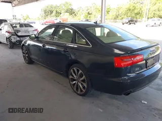 2014 Audi A6 Premium Plus with VIN WAUGFAFC1EN005090, listed as a IAAI auction lot 42137480 with 85,920 mi miles and . Bid and sale history available at DreamBid. Image 3.