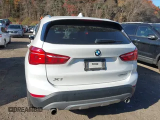 2019 BMW X1 xDrive28i with VIN WBXHT3C57K5L89697, listed as a IAAI auction lot 40729513 with 46,319 mi miles and . Bid and sale history available at DreamBid. Image 16.