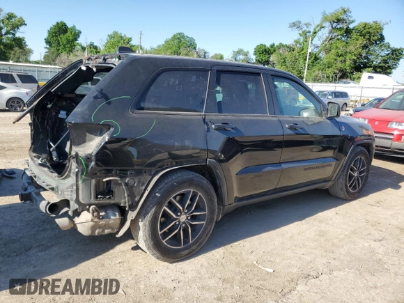 2017 Jeep Grand Cherokee Trailhawk with VIN 1C4RJFLG3HC881805, listed as a Copart auction lot 56471445 with 122,843 mi miles and Salvage title. Bid and sale history available at DreamBid. Image 3.