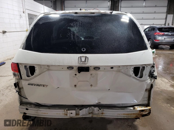 2015 Honda Odyssey EX-L with VIN 5FNRL5H68FB042107, listed as a Copart auction lot 51000525 with 140,793 mi miles and Salvage Title. Bid and sale history available at DreamBid. Image 6.