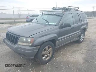 2002 Jeep Grand Cherokee Laredo with VIN 1J4GW48S92C294116, listed as a IAAI auction lot 42080375 with 154,108 mi miles and . Bid and sale history available at DreamBid. Image 2.