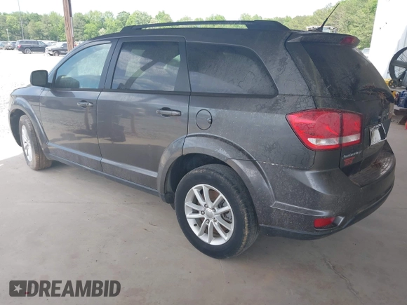 2014 Dodge Journey SXT with VIN 3C4PDCBB3ET144042, listed as a IAAI auction lot 42095860 with 154,847 mi miles. Bid and sale history available at carsss.com. Image 3.
