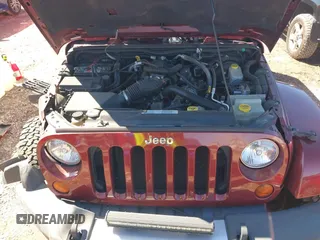 2008 Jeep Wrangler Unlimited Sahara с VIN 1J4GA59118L594851, выставлен на аукционе IAAI как лот 41643490 с пробегом 59 421 миль миль и . История ставок и продаж доступна на DreamBid. Изображение 10.