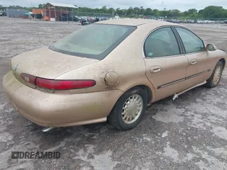 1996 Mercury Sable LS with VIN 1MELM53S6TA606332, listed as a IAAI auction lot 41984196 with 150,924 mi miles and . Bid and sale history available at DreamBid. Image 4.