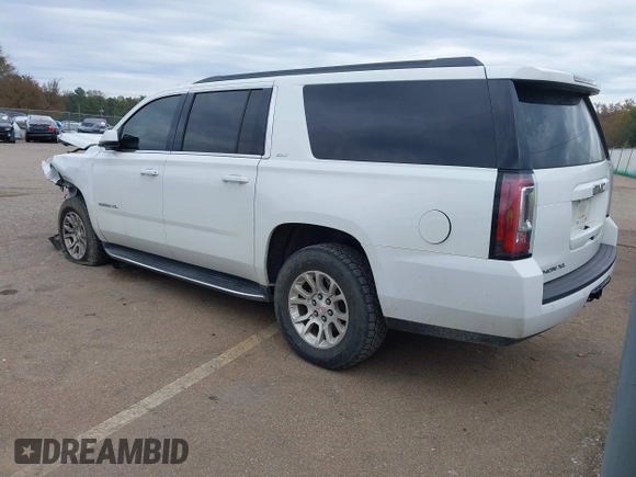2019 GMC Yukon XL SLT with VIN 1GKS2GKC7KR165419, listed as a IAAI auction lot 40977930 with 167,195 mi miles and . Bid and sale history available at carsss.com. Image 3.