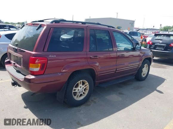 1999 Jeep Grand Cherokee Limited with VIN 1J4GW68S9XC653855, listed as a IAAI auction lot 42433370 with 275,724 mi miles and . Bid and sale history available at DreamBid. Image 4.