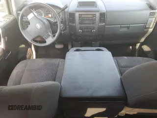2010 Nissan Titan SE with VIN 1N6BA0CH1AN313499, listed as a Copart auction lot 62477765 with 278,652 mi miles and Salvage title. Bid and sale history available at DreamBid. Image 8.