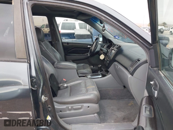 2006 Acura MDX Touring w/Navi with VIN 2HNYD18876H523408, listed as a IAAI auction lot 41756670 with 219,796 mi miles. Bid and sale history available at carsss.com. Image 5.