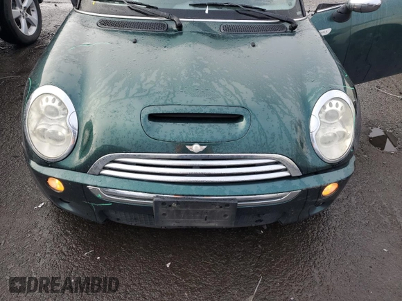 2007 MINI Convertible S with VIN WMWRH33517TL95143, listed as a Copart auction lot 88068045 with 115,827 mi miles and Salvage title. Bid and sale history available at DreamBid. Image 11.