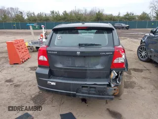 2011 Dodge Caliber Heat with VIN 1B3CB5HA7BD110672, listed as a IAAI auction lot 41709487 with 59,679 mi miles and . Bid and sale history available at DreamBid. Image 16.
