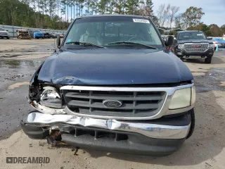 2003 Ford F-150 XL with VIN 1FTRX07273KB66549, listed as a Copart auction lot 83552004 with 205,026 mi miles and Salvage Title. Bid and sale history available at carsss.com. Image 5.