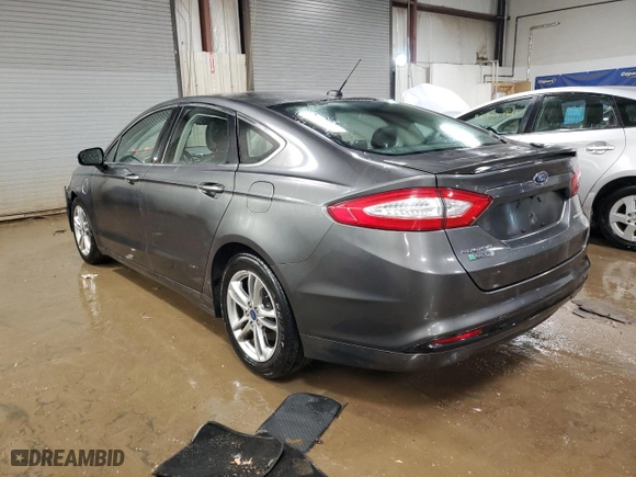 2016 Ford Fusion Energi Titanium with VIN 3FA6P0SU5GR273201, listed as a Copart auction lot 46515045 with 106,972 mi miles and Clean Title. Bid and sale history available at carsss.com. Image 2.