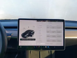 2022 Tesla Model Y Long Range with VIN 7SAYGAEE6NF361883, listed as a IAAI auction lot 41752441 with 50,493 mi miles and . Bid and sale history available at DreamBid. Image 18.