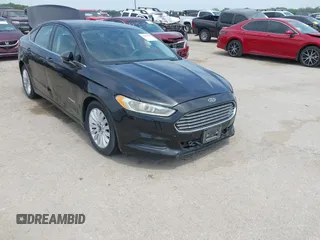 2013 Ford Fusion SE Hybrid z VIN 3FA6P0LU8DR272179, wystawiony jako IAAI lot #42058668 z przebiegiem 177 023 mil mil oraz . Historia ofert i sprzedaży dostępna na DreamBid. Obrazek 1.