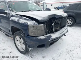 2007 Chevrolet Silverado 1500 LTZ with VIN 2GCEK13M771535698, listed as a IAAI auction lot 41295982 with 216,232 mi miles. Bid and sale history available at carsss.com. Image 6.