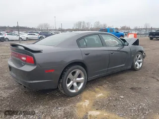 2014 Dodge Charger RT Plus with VIN 2C3CDXCT6EH159466, listed as a IAAI auction lot 41717142 with 104,462 mi miles. Bid and sale history available at carsss.com. Image 4.