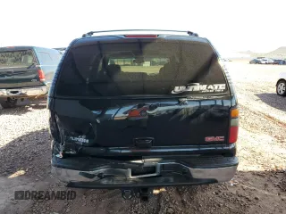 2004 GMC Yukon SLT z VIN 1GKEK13Z64R319621, wystawiony jako Copart lot #59622995 z przebiegiem 228 726 mil mil oraz Szkoda całkowita • Salvage title. Historia ofert i sprzedaży dostępna na DreamBid. Obrazek 6.
