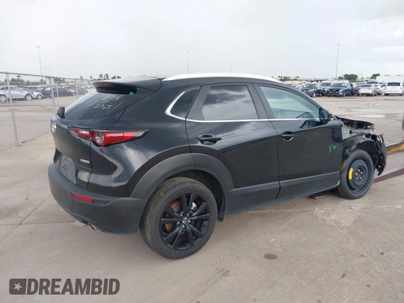 2024 Mazda CX-30 S Select Sport with VIN 3MVDMBBM3RM700797, listed as a IAAI auction lot 42686898 with 23,170 mi miles and . Bid and sale history available at DreamBid. Image 4.