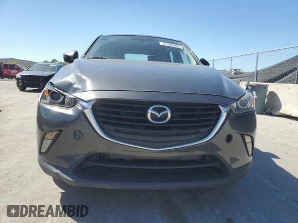 2017 Mazda CX-3 Touring z VIN JM1DKDC73H0172403, wystawiony jako Copart lot #47396355 z przebiegiem 79 865 mil mil oraz Szkoda całkowita • Salvage title. Historia ofert i sprzedaży dostępna na DreamBid. Obrazek 5.
