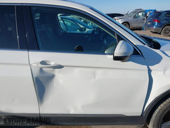 2018 Volkswagen Tiguan SEL Premium with VIN 3VV5B7AX2JM202908, listed as a IAAI auction lot 41137619 with 84,323 mi miles and . Bid and sale history available at DreamBid. Image 17.