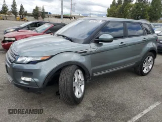 2015 Land Rover Range Rover Evoque Pure Plus z VIN SALVP2BGXFH005247, wystawiony jako Copart lot #56670105 z przebiegiem 85 556 mil mil oraz Szkoda całkowita • Salvage title. Historia ofert i sprzedaży dostępna na DreamBid. Obrazek 1.