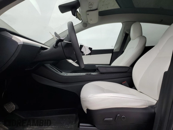 2022 Tesla Model Y Long Range with VIN 7SAYGDEE1NF315198, listed as a Copart auction lot 50399005 with 33,357 mi miles and Salvage Title. Bid and sale history available at DreamBid. Image 7.