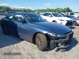 2022 BMW 4 Series 430i xDrive z VIN WBA73AP00NCH75602, wystawiony jako IAAI lot #42200149 z przebiegiem 68 540 mil mil oraz . Historia ofert i sprzedaży dostępna na DreamBid. Obrazek 1.