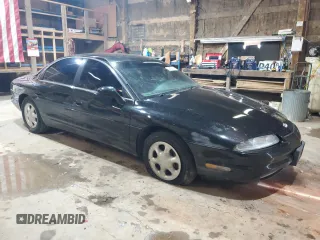 1999 Oldsmobile Aurora with VIN 1G3GR62C1X4109326, listed as a Copart auction lot 49550935 with 208,500 mi miles and Clean Title. Bid and sale history available at DreamBid. Image 4.