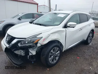 2018 Nissan Murano Platinum with VIN 5N1AZ2MH9JN163641, listed as a IAAI auction lot 41922735 with 70,884 mi miles and . Bid and sale history available at DreamBid. Image 2.