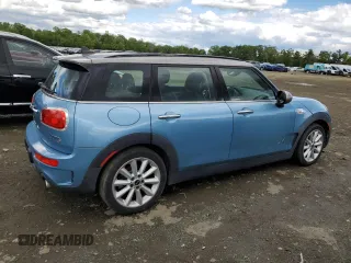 2017 MINI Clubman Cooper S z VIN WMWLU5C5XH2E83566, wystawiony jako Copart lot #57919305 z przebiegiem 89 983 mil mil oraz Tytuł czysty. Historia ofert i sprzedaży dostępna na DreamBid. Obrazek 3.