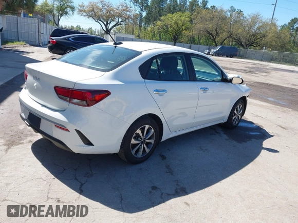 2023 Kia Rio S with VIN 3KPA24AD8PE554914, listed as a IAAI auction lot 41741938 with 24,224 mi miles. Bid and sale history available at carsss.com. Image 4.