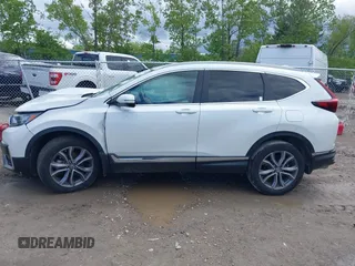 2020 Honda CR-V Touring z VIN 2HKRW2H97LH676151, wystawiony jako IAAI lot #42340956 z przebiegiem 32 492 mil mil oraz . Historia ofert i sprzedaży dostępna na DreamBid. Obrazek 14.