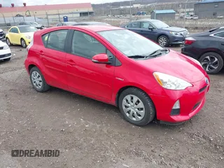 2012 Toyota Prius c One with VIN JTDKDTB33C1527017, listed as a IAAI auction lot 41948154 with 103,994 mi miles. Bid and sale history available at carsss.com. Image 1.