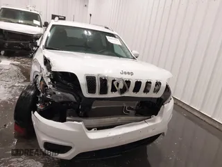 2021 Jeep Cherokee Latitude with VIN 1C4PJMCB7MD166000, listed as a IAAI auction lot 41631945 with 48,046 mi miles and . Bid and sale history available at DreamBid. Image 12.