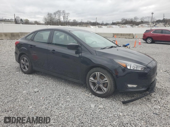 2018 Ford Focus SE with VIN 1FADP3FE0JL318465, listed as a Copart auction lot 51136615 with 82,191 mi miles and Salvage Title. Bid and sale history available at carsss.com. Image 4.