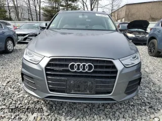 2016 Audi Q3 Premium Plus with VIN WA1EFCFS3GR003165, listed as a Copart auction lot 51304395 with 105,127 mi miles and Salvage Title. Bid and sale history available at carsss.com. Image 5.