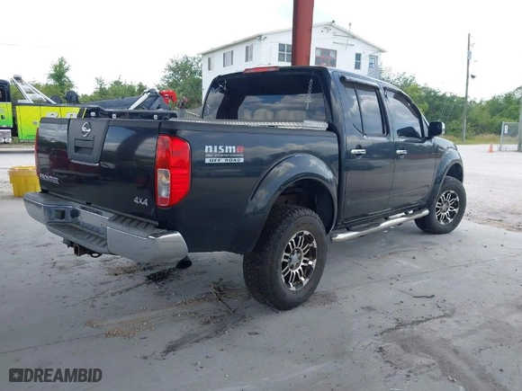 2005 Nissan Frontier 4WD SE with VIN 1N6AD07W55C458719, listed as a IAAI auction lot 41964083 with 189,814 mi miles. Bid and sale history available at carsss.com. Image 4.