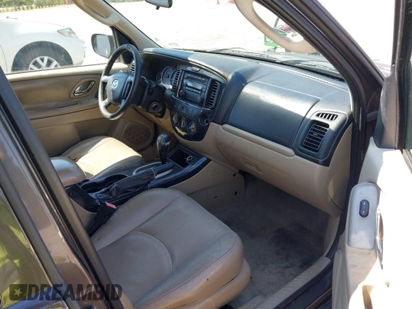 2006 Mazda Tribute i with VIN 4F2YZ02Z36KM29148, listed as a IAAI auction lot 42044163 with 175,786 mi miles and . Bid and sale history available at carsss.com. Image 5.