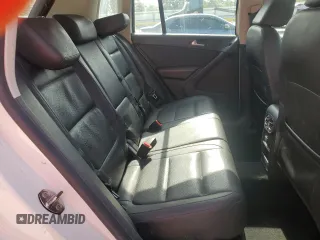 2016 Volkswagen Tiguan SE z VIN WVGBV7AX1GW528888, wystawiony jako Copart lot #59057125 z przebiegiem 143 688 mil mil oraz Czysty tytuł • Clean title. Historia ofert i sprzedaży dostępna na DreamBid. Obrazek 11.