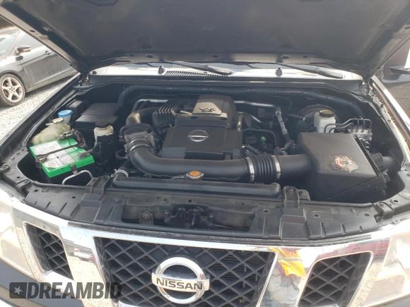2010 Nissan Frontier LE with VIN 1N6AD0EV3AC407062, listed as a Copart auction lot 60444785 with 96,631 mi miles and Salvage title. Bid and sale history available at DreamBid. Image 11.