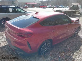 2021 BMW X6 xDrive40i with VIN 5UXCY6C01M9F72797, listed as a IAAI auction lot 41810317 with 16,084 mi miles. Bid and sale history available at carsss.com. Image 4.