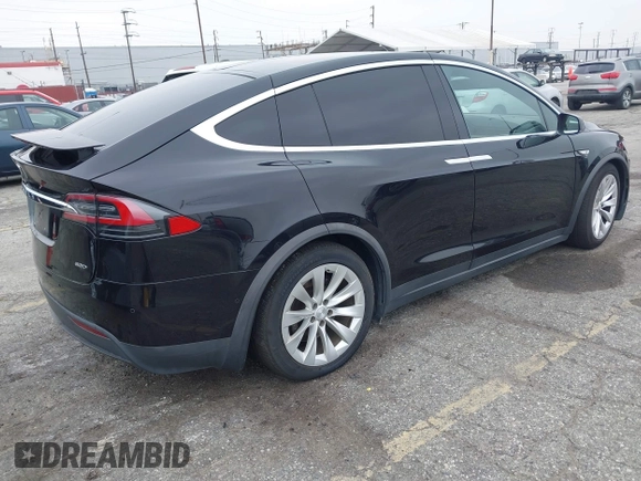 2016 Tesla Model X 70D with VIN 5YJXCBE2XGF019095, listed as a IAAI auction lot 42025230 with 109,660 mi miles and . Bid and sale history available at DreamBid. Image 4.
