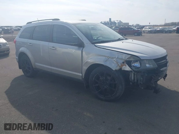 2013 Dodge Journey SXT with VIN 3C4PDDBG9DT680798, listed as a IAAI auction lot 41655958 with 140,594 mi miles and . Bid and sale history available at DreamBid. Image 1.