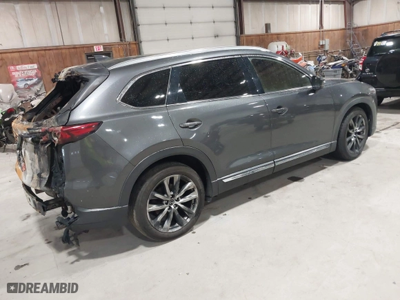 2016 Mazda CX-9 Signature with VIN JM3TCBEY7G0120460, listed as a IAAI auction lot 41913584 with 114,901 mi miles. Bid and sale history available at carsss.com. Image 4.