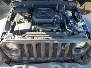 2023 Jeep Wrangler Sport with VIN 1C4HJXDN9PW512460, listed as a Copart auction lot 77107894 with 23,142 mi miles and Salvage Title. Bid and sale history available at DreamBid. Image 12.