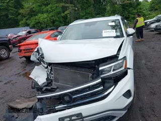 2021 Volkswagen Atlas SE z VIN 1V2KE2CAXMC202664, wystawiony jako IAAI lot #42292276 z przebiegiem 57 760 mil mil oraz . Historia ofert i sprzedaży dostępna na DreamBid. Obrazek 12.