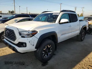 2023 Toyota Tacoma 4WD SR with VIN 3TMCZ5AN3PM618642, listed as a Copart auction lot 50386825 with 35,016 mi miles and Salvage Title. Bid and sale history available at carsss.com. Image 1.