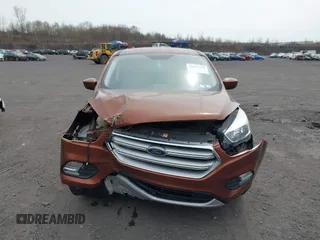 2017 Ford Escape SE with VIN 1FMCU9GD5HUA57132, listed as a IAAI auction lot 42075470 with 106,271 mi miles. Bid and sale history available at carsss.com. Image 12.